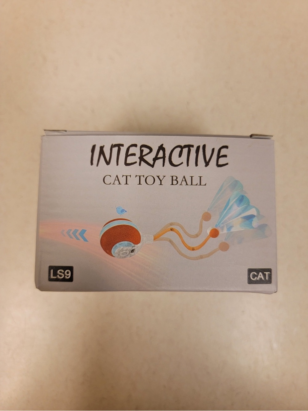 Interactive Cat Toy Ball - Orange and White - USB Charged (Cable Included)